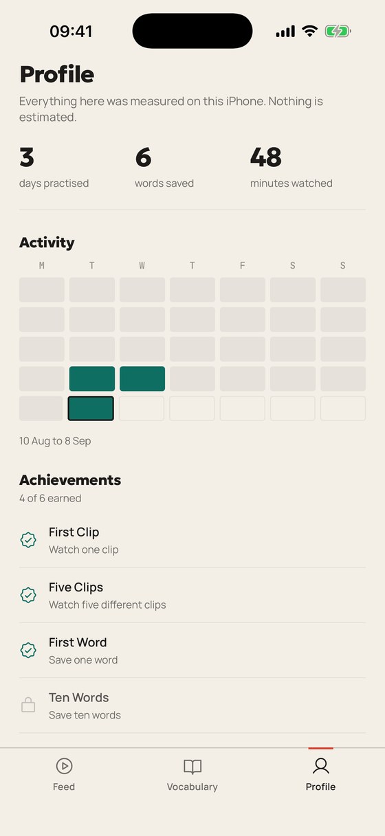 The profile screen with days practised, words saved, minutes watched and achievements.